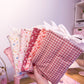 Pochette à livre ou liseuse | Rouge et fleurs blanches